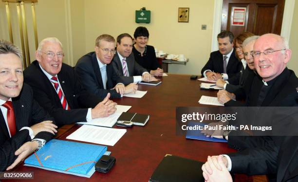 The Reverend Ian Paisley, leader of the Democratic Unionist Party, with Deputy Leader Peter Robinson meets the head of the Catholic Church in...