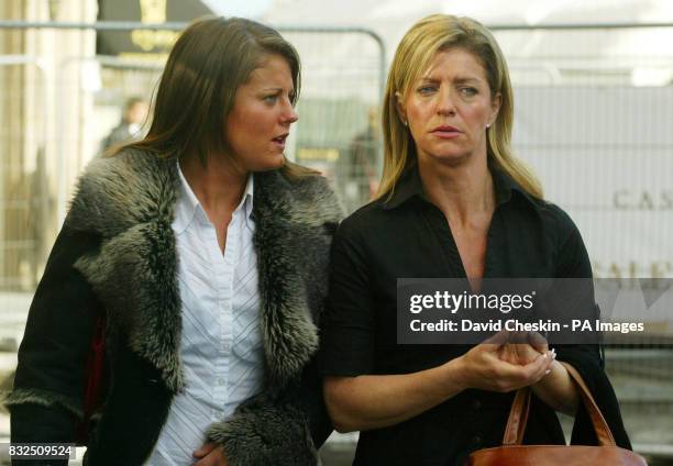 Angela Donald , the mother of schoolboy Kriss Donald, who was killed after being attacked by knives and set on fire, and her daughter Samantha...