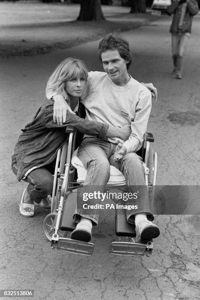 Barry Sheene , who suffered two broken legs and a broken arm in a crash at Silverstone in July, is pictured with his girlfriend Stephanie McLean...