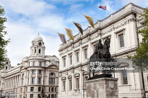 whitehall street in london a cloudy - foreign office stock pictures, royalty-free photos & images