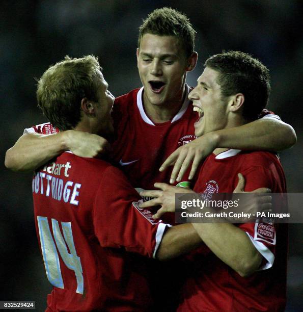 Southend United's Gary Hooper celebrates his goal against Leeds with team-mates Luke Guttridge and Simon Francis during the Carling Cup third round...