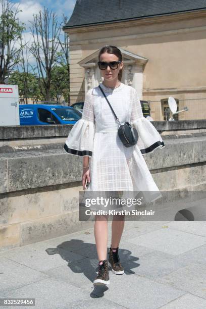 Fashion designer of clothing brand Anna K Anna Karenina wears an Anna K dress, Celine sunglasses, Louis Vuitton trainers and a Marc Jacobs bag day 2...