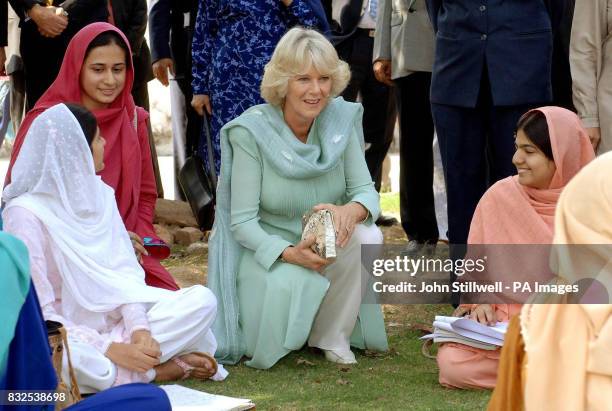 The Duchess of Cornwall talks to students at the Fatima Jinnah college in Rawalpindi, Pakistan.