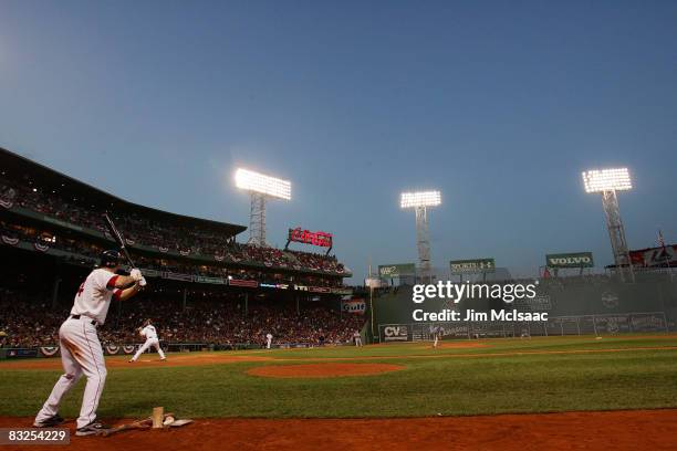 Drew of the Boston Red Sox bats as his teammate Jason Bay stands on deck against the Tampa Bay Rays in game three of the American League Championship...
