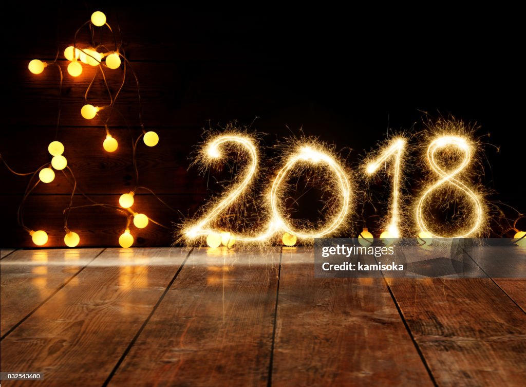 Sparkler New Year 2018 On Wooden Floor