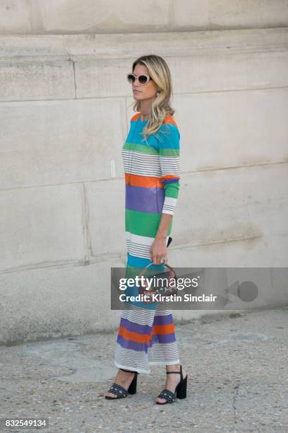 Fashion blogger Helena Bordon wears a Diana Von Fusternberg dress, Tabitha Simmons shoes, Helena Bordon sunglasses and a Paula Cademartori bag day 2...