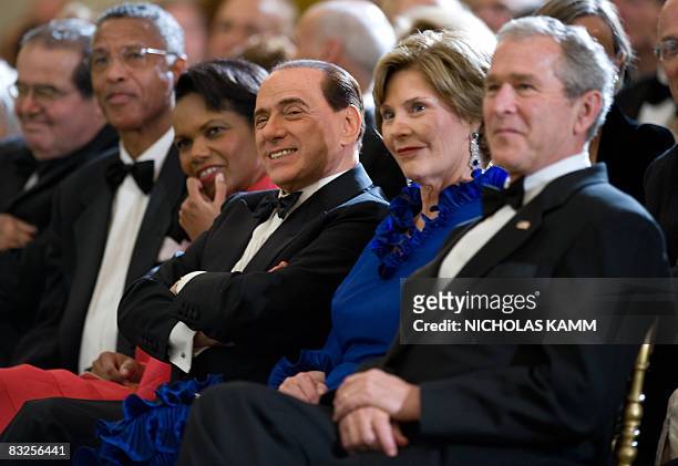 Italian Prime Minister Silvio Berlusconi , US President George W. Bush , his wife Laura , US Scretary of State Condoleezza Rice and US Supreme Court...