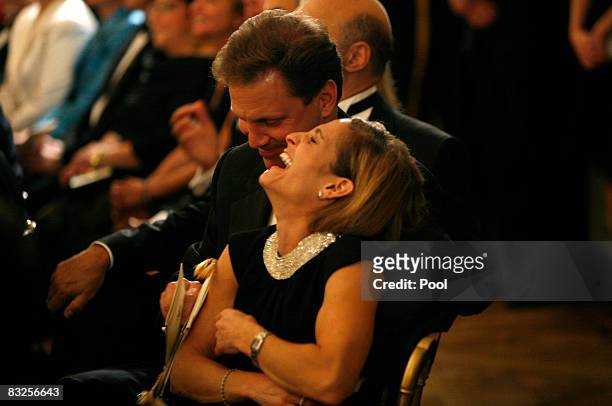 Mary-Lou Retton Kelley and her husband Shannon Kelley laugh during a performance by the Jersey Boys following a dinner hosted by President George W....