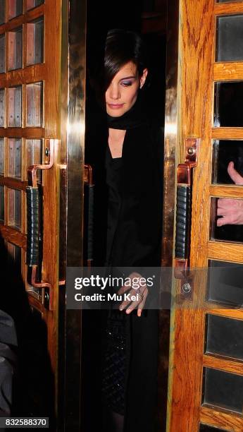 Tom Cruise and Katie Holmes dine at The Ivy restaurant before returning to their hotel on January 21, 2009 in London, England.