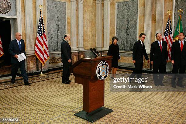 Secretary Henry M. Paulson, Federal Reserve Chairman Ben Bernanke, and Federal Deposit Insurance Corp Chairman Sheila Bair, Chief Executive Officer...