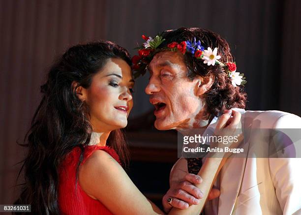Mariella Ahrens Graefin von Faber-Castell as Buhlschaft and Wilfried Glatzeder as Jedermann perform during the dress rehearsal for the play...