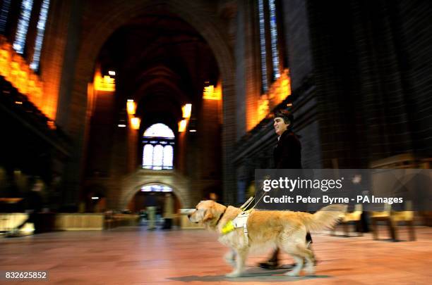 Maureen Rowley from Bristol with her guide dog Gus, who attended a mass at Liverpool Cathedral to celebrate 75 years of the Guide Dogs for the Blind...