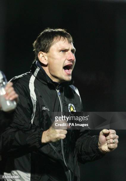 Torquay United manager Lubos Kubik reacts to a penalty save by Torquay goalkeeper Nathan Abbey during the League Two match at Edgar Street Athletic...
