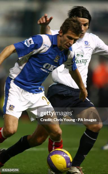 Portsmouth's Gary O'Neil and Everon's Jorge Nuno Valente battle for the ball