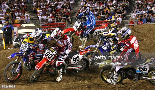 Riders participating in the 2005 season finale of the THQ/AMA Supercross series at Sam Boyd Stadium on May 7, 2005 in Las Vegas battled for the final...