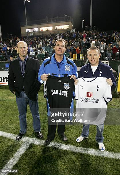 Owner Jon Fisher and President Mike Crowley of the San Jose Earthquakes pose for a photo with Executive Director Paul Barber of the Tottenham...