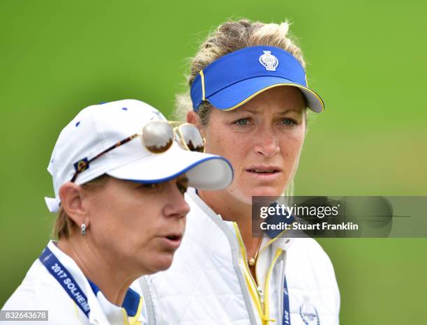 Annika Sorenstam, Team Europe Captain talks with Suzann Pettersen during practice for The Solheim Cup at the Des Moines Country Club on August 16,...