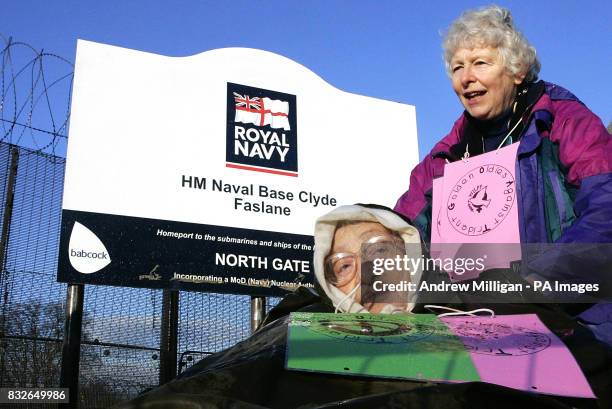 Alice Beer and her friend Liz Brandow protest outside Faslane on the River Clyde, Scotland, the Trident nuclear submarine base.