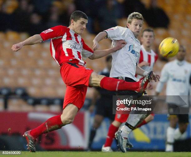 Port Vale's Ross Gardner and Brenford's John Mousinho during the Coca-Cola League One match at Vale Park, Stoke-on-Trent.