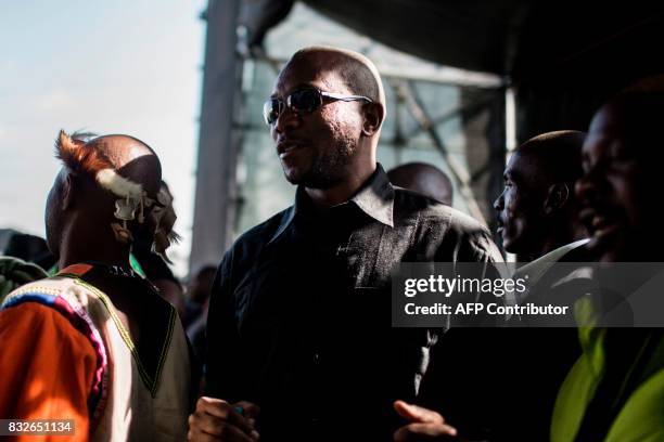 South Africa's Democratic Alliance opposition party leader Mmusi Maimane is pictured as members of the Association of Mineworkers and the Marikana...