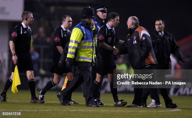 Charlton Athletic's manager Les Reed shakes hands with the referee following their 1-0 loss to Wycombe Wanderers in the Carling Cup Quarter-Final...