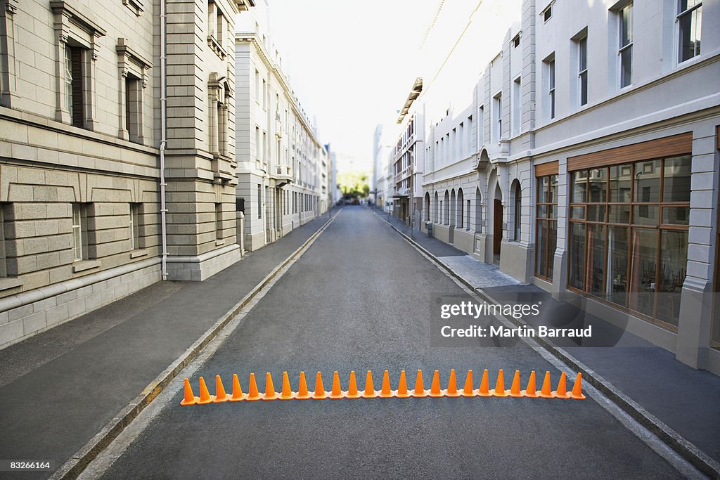 Line of traffic cones in urban roadway