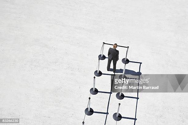 businesswoman at blocked end of cordon posts - dead end stock pictures, royalty-free photos & images