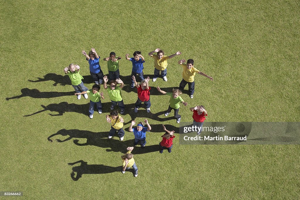 Group of children waving