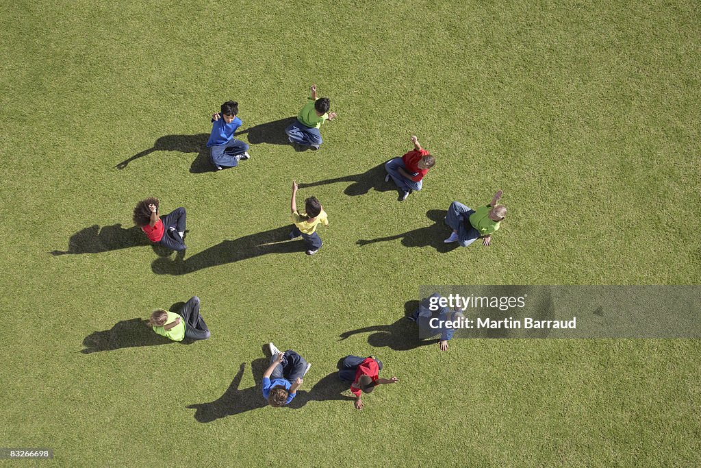 Group of children sitting in a circle playing