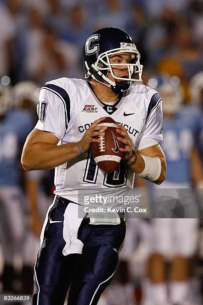 Zach Frazer of the Connecticut Huskies looks for a receiver during the game against the North Carolina Tar Heels at Kenan Stadium on October 4, 2008...