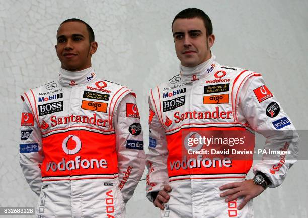 Vodafone McLaren Mercedes drivers Lewis Hamilton of Great Britain, and World Champion Fernando Alonso of Spain , are unveiled during the photocall of...