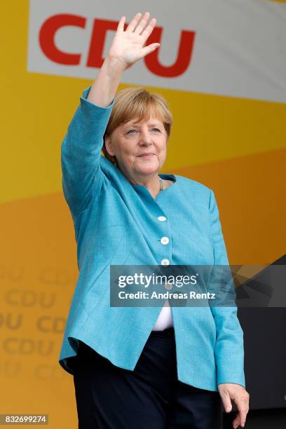 German Chancellor and head of the German Christian Democrats Angela Merkel greets supporters after an election rally at the headland known as the...