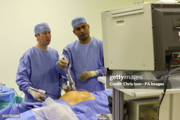 Consultant Surgeon Andrew Miles and Registrar Jim Khan perform a Laparoscopic Anterior Resection on a patient at the Royal Hampshire County Hospital...
