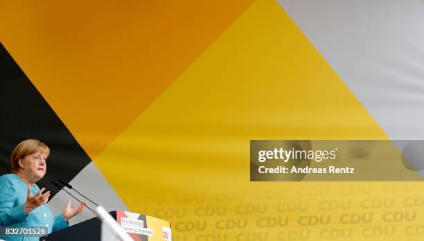 German Chancellor and head of the German Christian Democrats Angela Merkel speaks on stage at an election rally at the headland known as the...