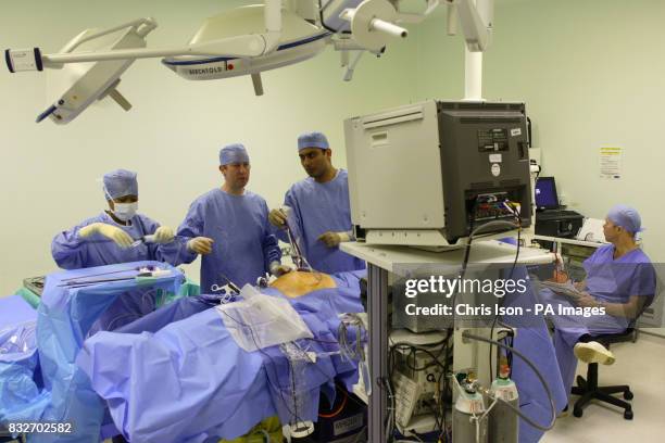 Consultant Surgeon Andrew Miles and Registrar Jim Khan perform a Laparoscopic Anterior Resection on a patient at the Royal Hampshire County Hospital...