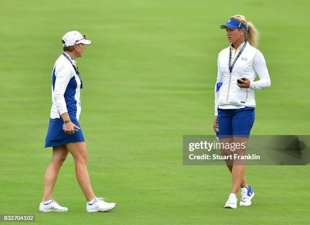 Annika Sorenstam, Team Europe Captain talks with Suzann Pettersen during practice for The Solheim Cup at the Des Moines Country Club on August 16,...