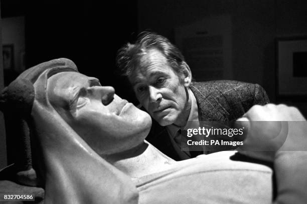 Actor Peter O'Toole views a cement cast of Eric Kennington's portrait of T.E Lawrence at the National Portrait Gallery in London, before the opening...