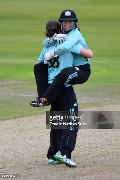 Tammy Beaumont hugs Rene Farrell of Surrey Stars after they win the Kia Super League 2017 match between Lancashire Thunder and Surrey Stars at Old...