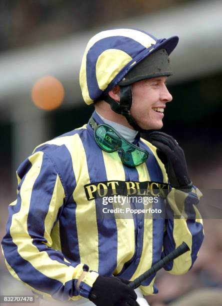 Jockey Richard Johnson, aboard Made in Japan, after their victory in the Triumph Hurdle on the third day of the annual National Hunt Festival held at...