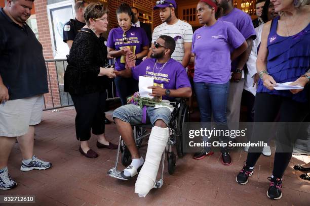 Marcus Martin , who was injured when a car plowed into a crowd of people protesting against the white supremacist Unite the Right rally, leaves the...