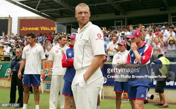 England captain Andrew Flintoff waits to shake the hands of the victorius Australian players after England lose the 3rd Test match between Australia...