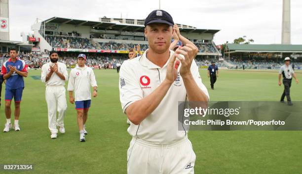 England captain Andrew Flintoff applauds the England fans after England lose the 3rd Test match between Australia and England by 206 runs and concede...