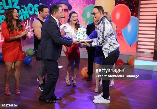 Daniel Sarcos and Alexis Valdes are seen on the set of 'Un Nuevo Dia' at Telemundo Studios on August 16, 2017 in Miami, Florida.