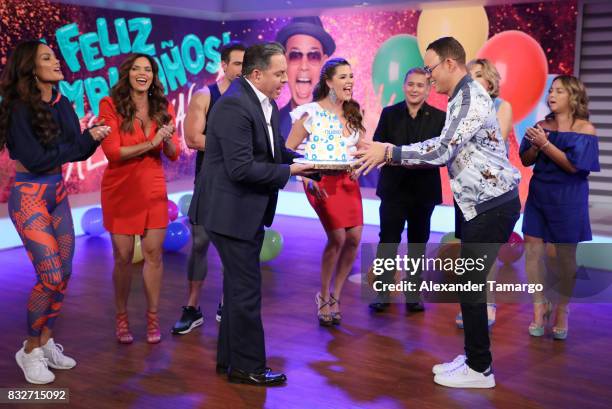 Zuleyka Rivera, Rashel Diaz, Daniel Sarcos, Alicia Machado, Alexis Valdes and Adamari Lopez is seen on the set of 'Un Nuevo Dia' at Telemundo Studios...