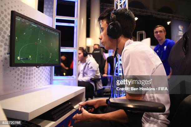 Henrique "Zezinho23XX" Lempke Silva of Brazil in action during day one of the FIFA Interactive World Cup 2017 on August 16, 2017 in London, England.