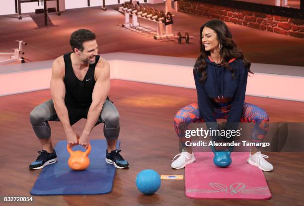 Roberto Manrique and Zuleyka Rivera are seen on the set of 'Un Nuevo Dia' at Telemundo Studios on August 16, 2017 in Miami, Florida.