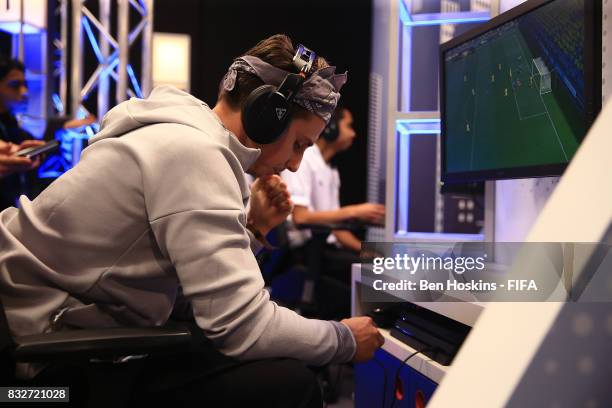 Johann "Maniika" Simon of France celebrates scoring a goal in his game against Marcus "Marcus_7170" Gomes of Australia during day one of the FIFA...