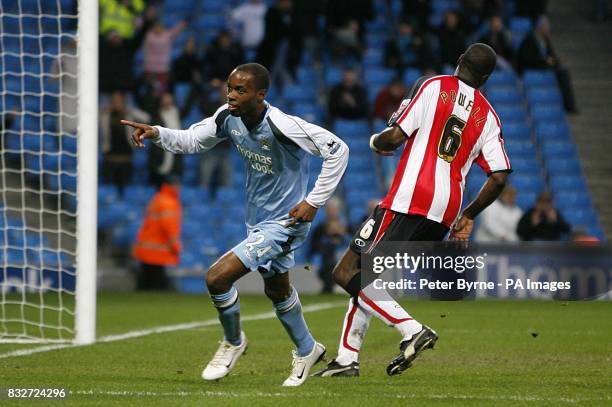 Manchester City's DaMarcus Beasley turns away to celebrate scoring his sides third goal of the match, as Southampton's Darren Powell turns away...