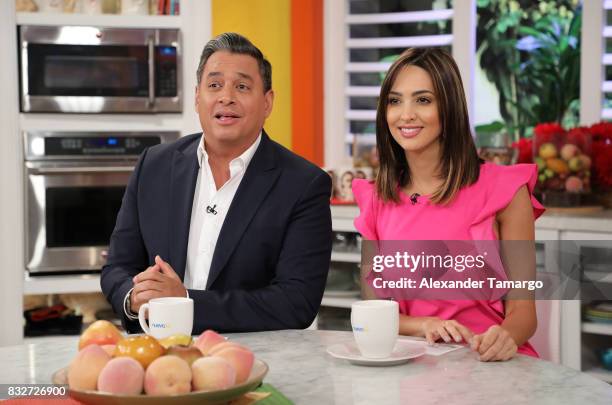 Daniel Sarcos and Erika Csiszer are seen on the set of 'Un Nuevo Dia' at Telemundo Studios on August 16, 2017 in Miami, Florida.