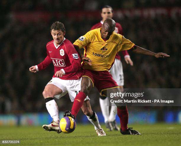 Manchester United's Ole Gunnar Solskjaer and Watford's Damien Francis battle for the ball